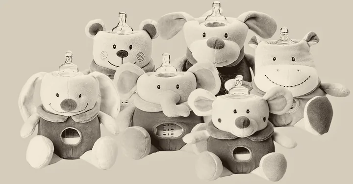 The MilkySnugz range: six plush animal comforters, each holding a baby bottle